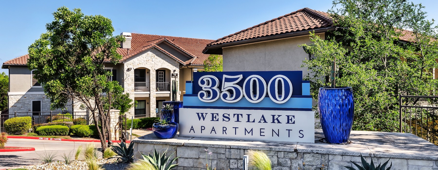 a sign in front of a building