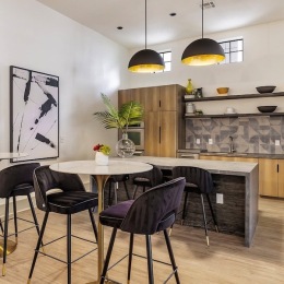 a community kitchen with tables and chairs